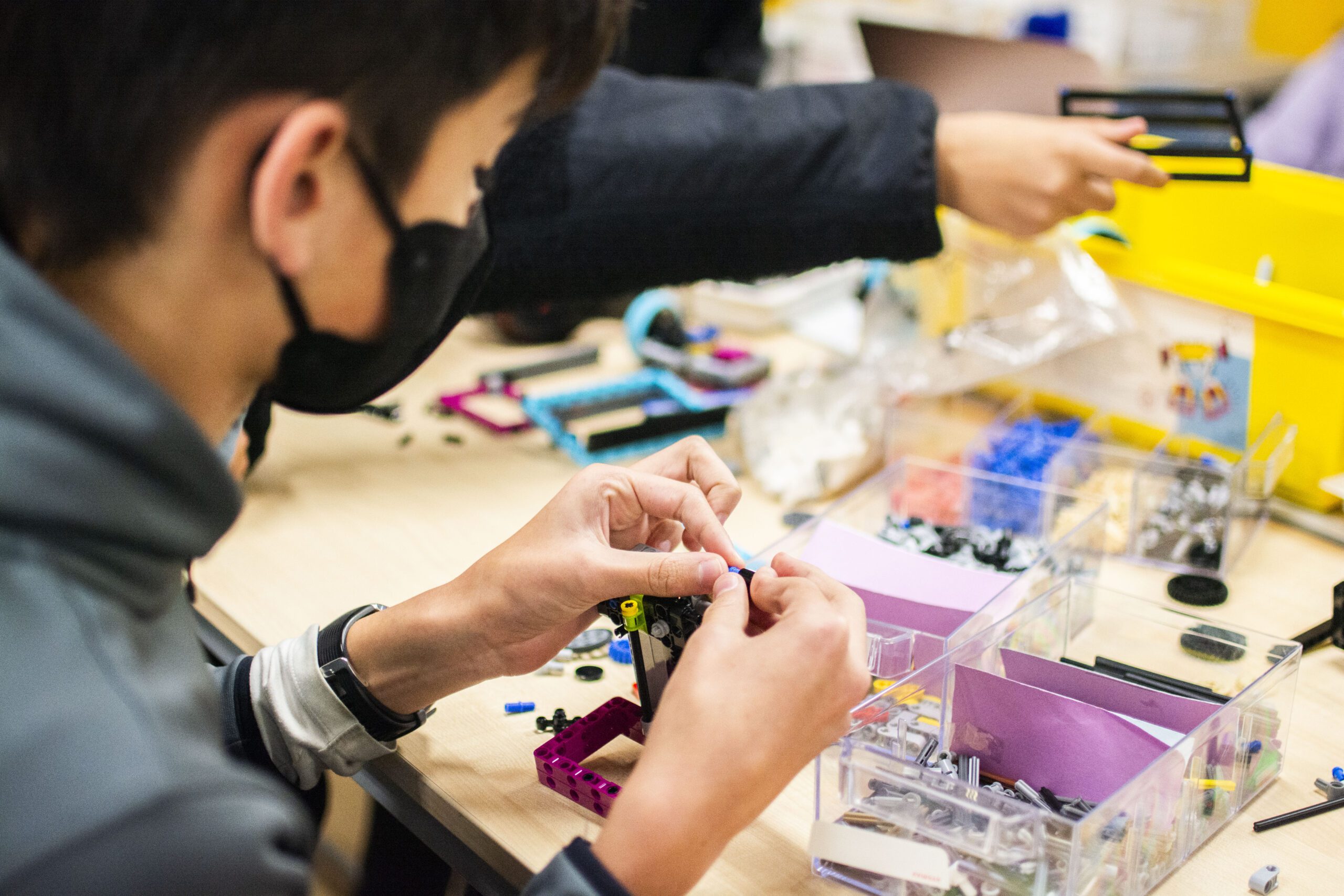 Student working on lego robotics
