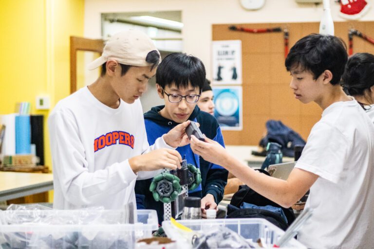 Students working on VEX robotics projects