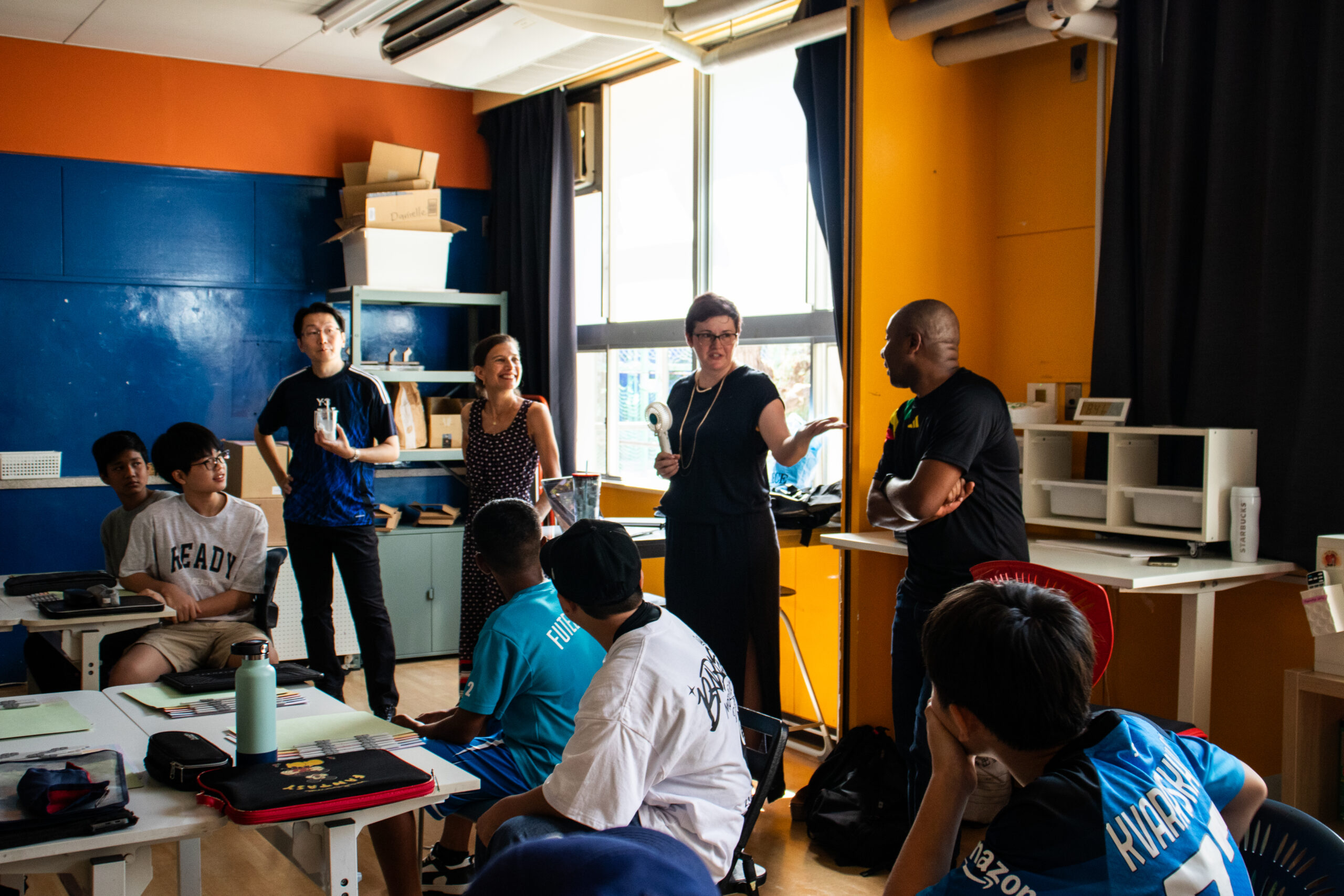 Teachers presenting to an MYP class