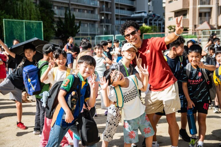 Students and staff greeting